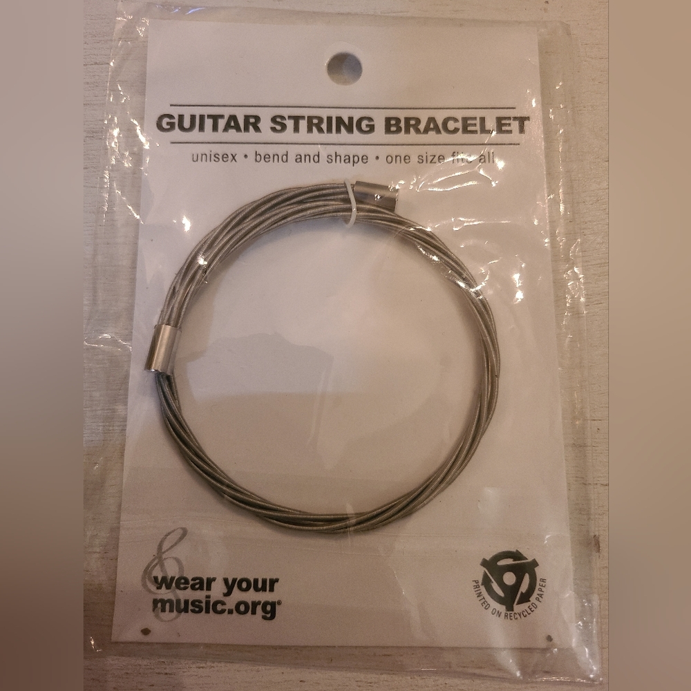 Silver guitar string bracelet